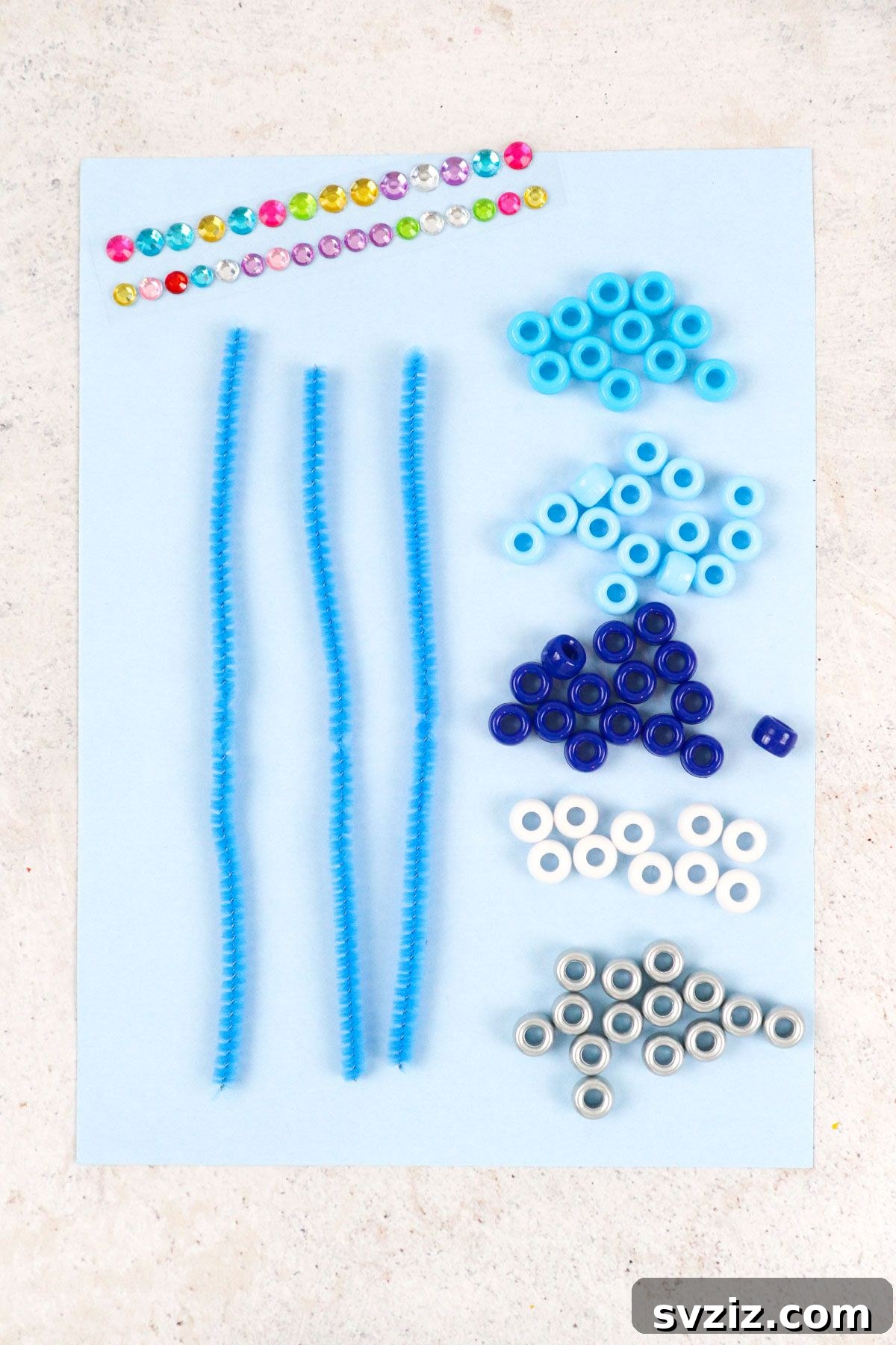 Cute Pipe Cleaner Snowflakes Materials displayed on a surface