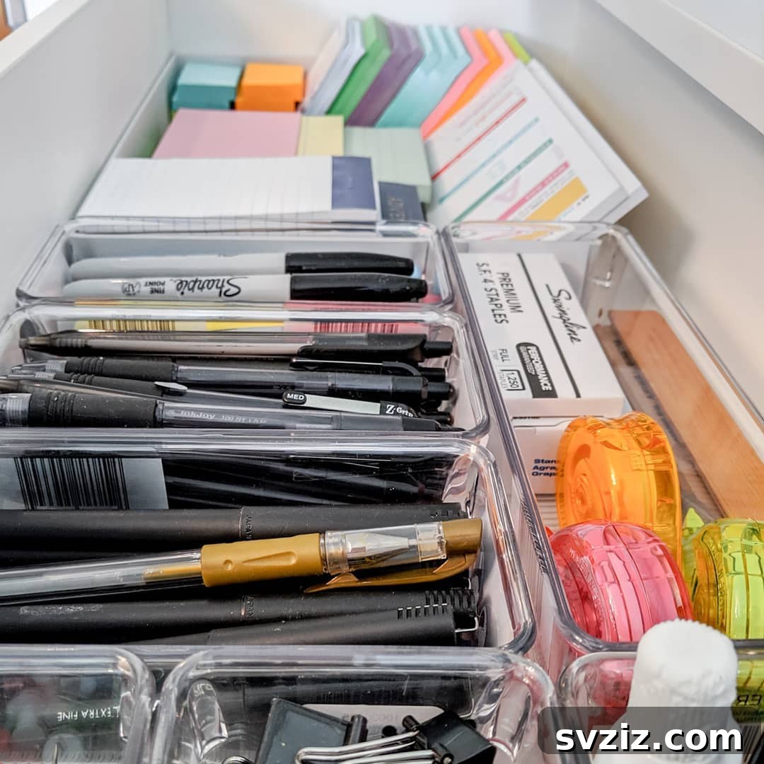 25 Genius Desk Drawer Organization Tips 18 Desk drawer organized by upcycling old electronics boxes and small containers