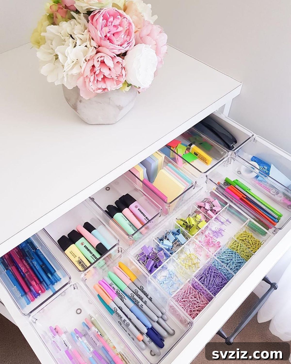 25 Genius Desk Drawer Organization Tips 3 Desk drawer organized with a pastel coordinated stationery set