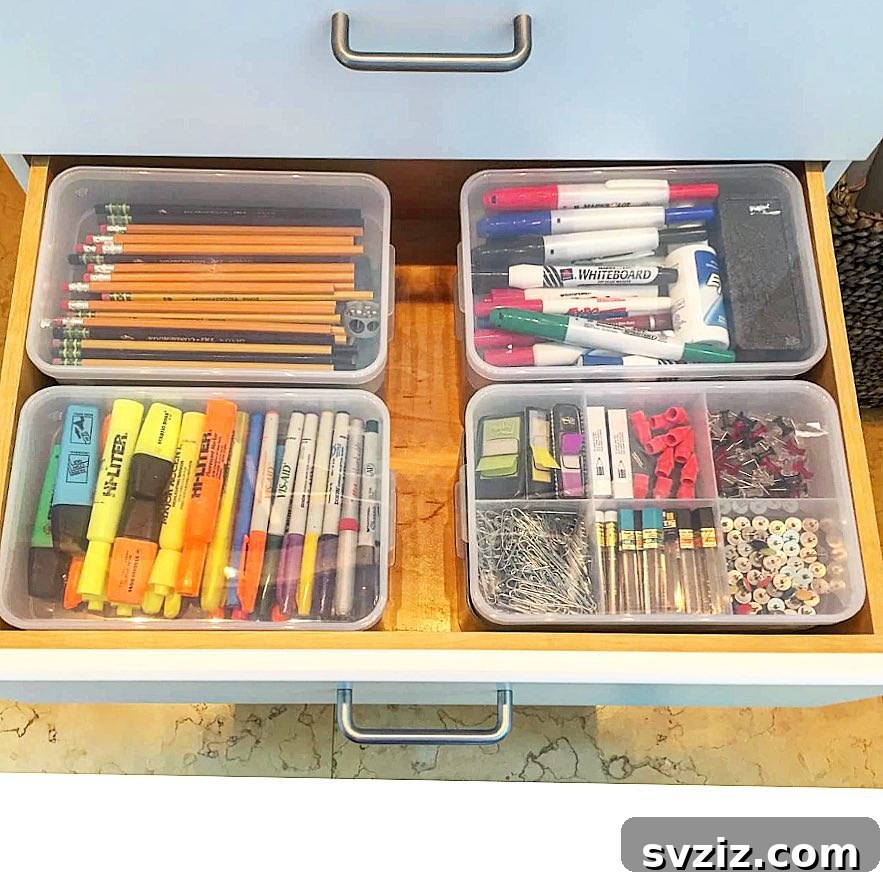 25 Genius Desk Drawer Organization Tips 9 Desk drawer with a divided container sorting small craft supplies
