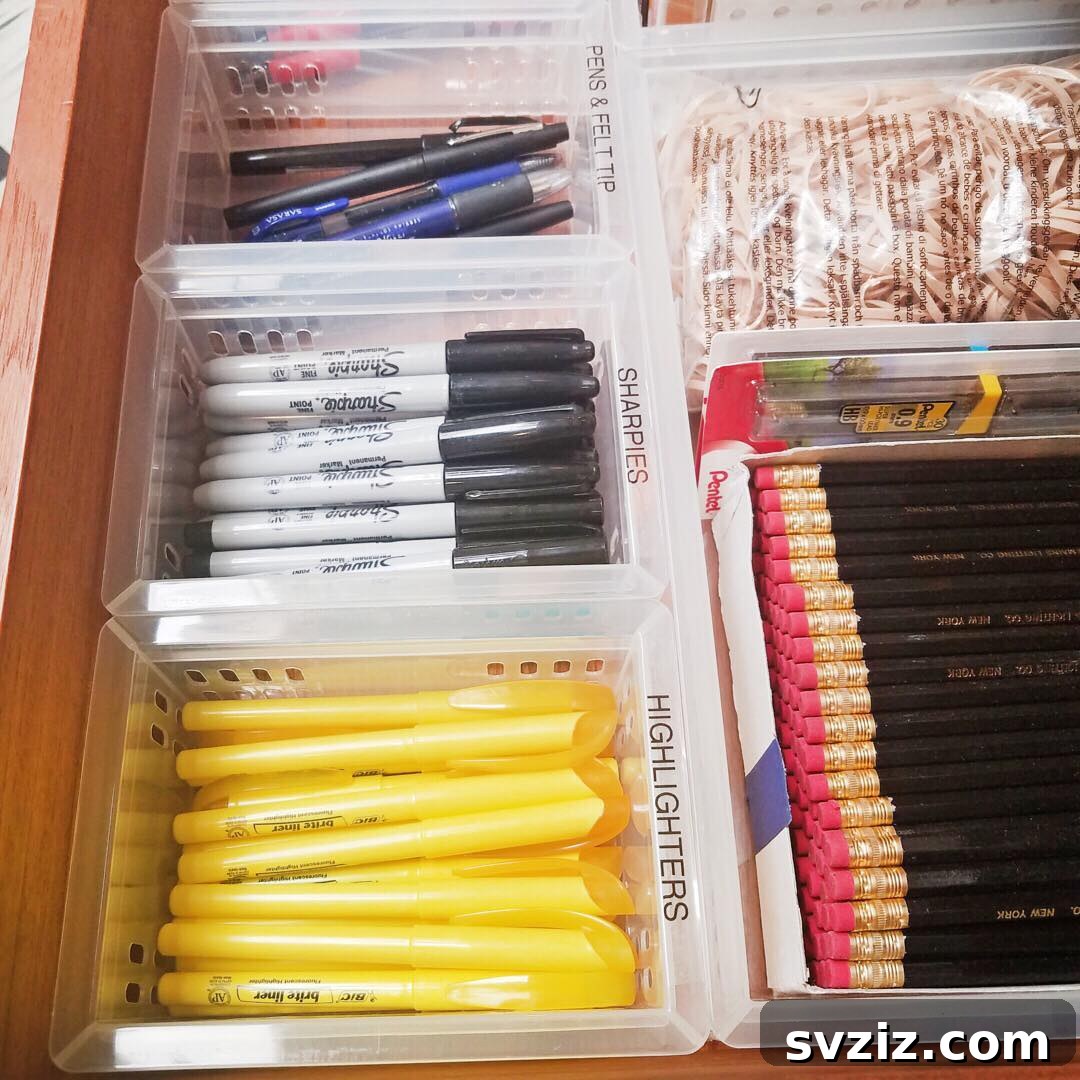 25 Genius Desk Drawer Organization Tips 10 Desk drawer with organizers featuring upward-facing labels for easy identification