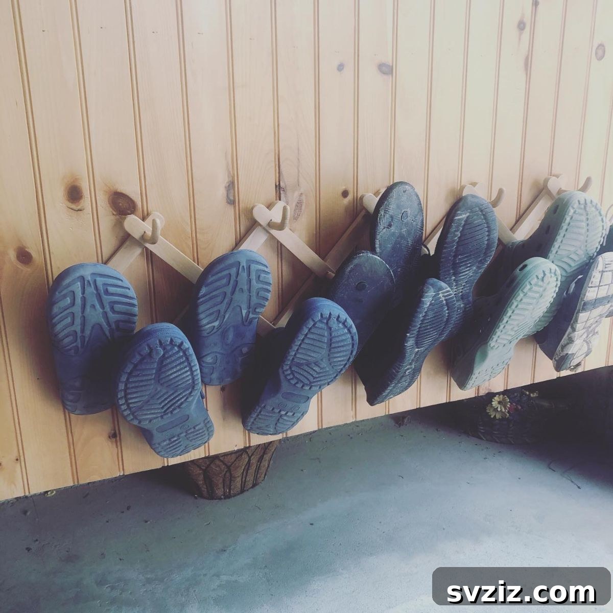 Creative Garage Shoe Organization with an Upcycled Accordion Coat Rack