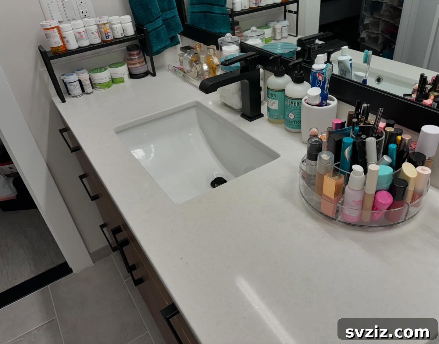 17 Brilliant Bathroom Counter Organization Secrets 3 1. Divided Storage for Two-Sink Vanity