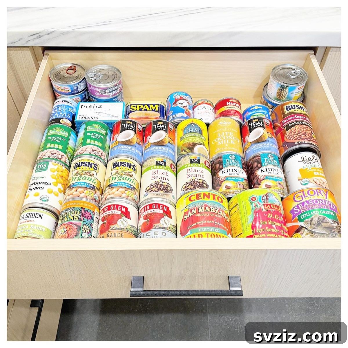 Smart Strategies for Organizing Canned Goods 12 Canned Goods Lined Up in a Drawer