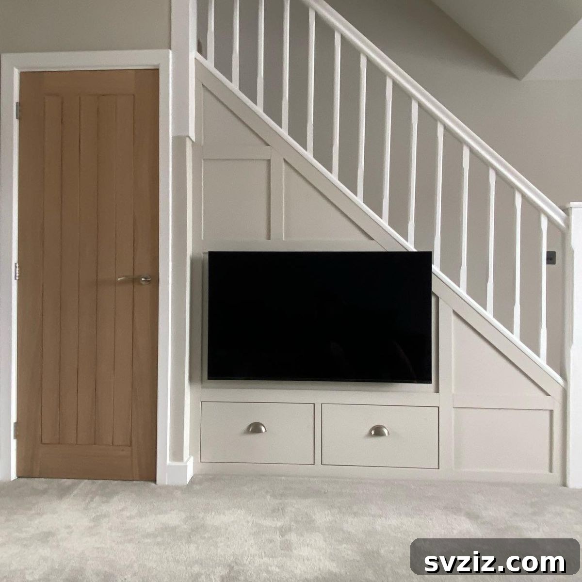 Reimagine Your Stairs: 23 Smart Storage Ideas for Hidden Spaces 8 Under Stairs TV Nook with Storage