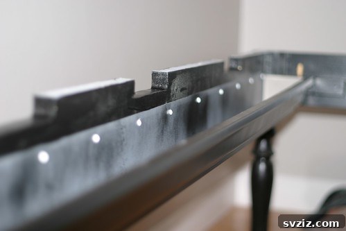 Rain gutter cable management under desk