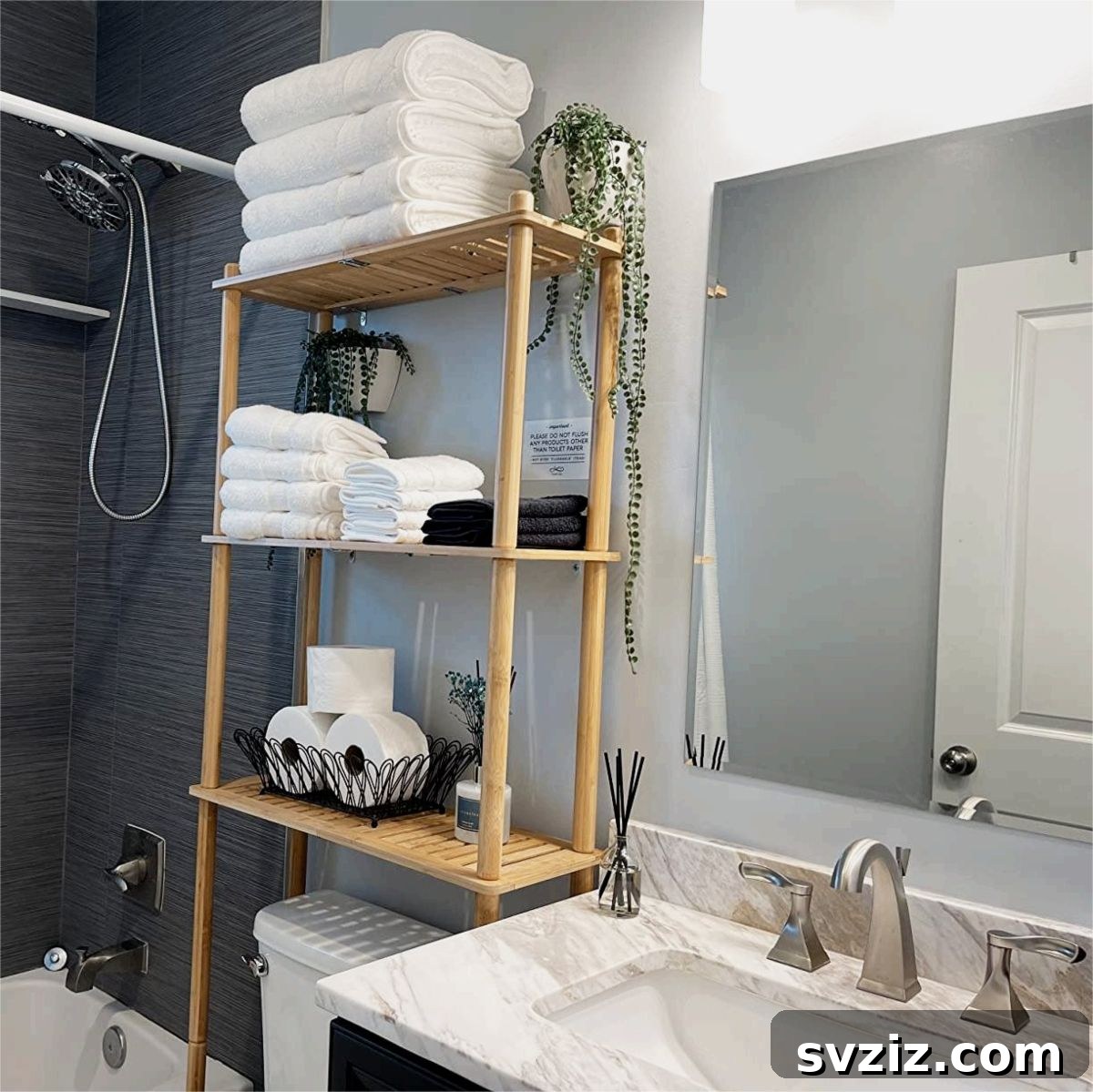 21 Smart Ways to Utilize the Space Above Your Toilet 13 Spacious towel storage shelves above a toilet in a modern bathroom.