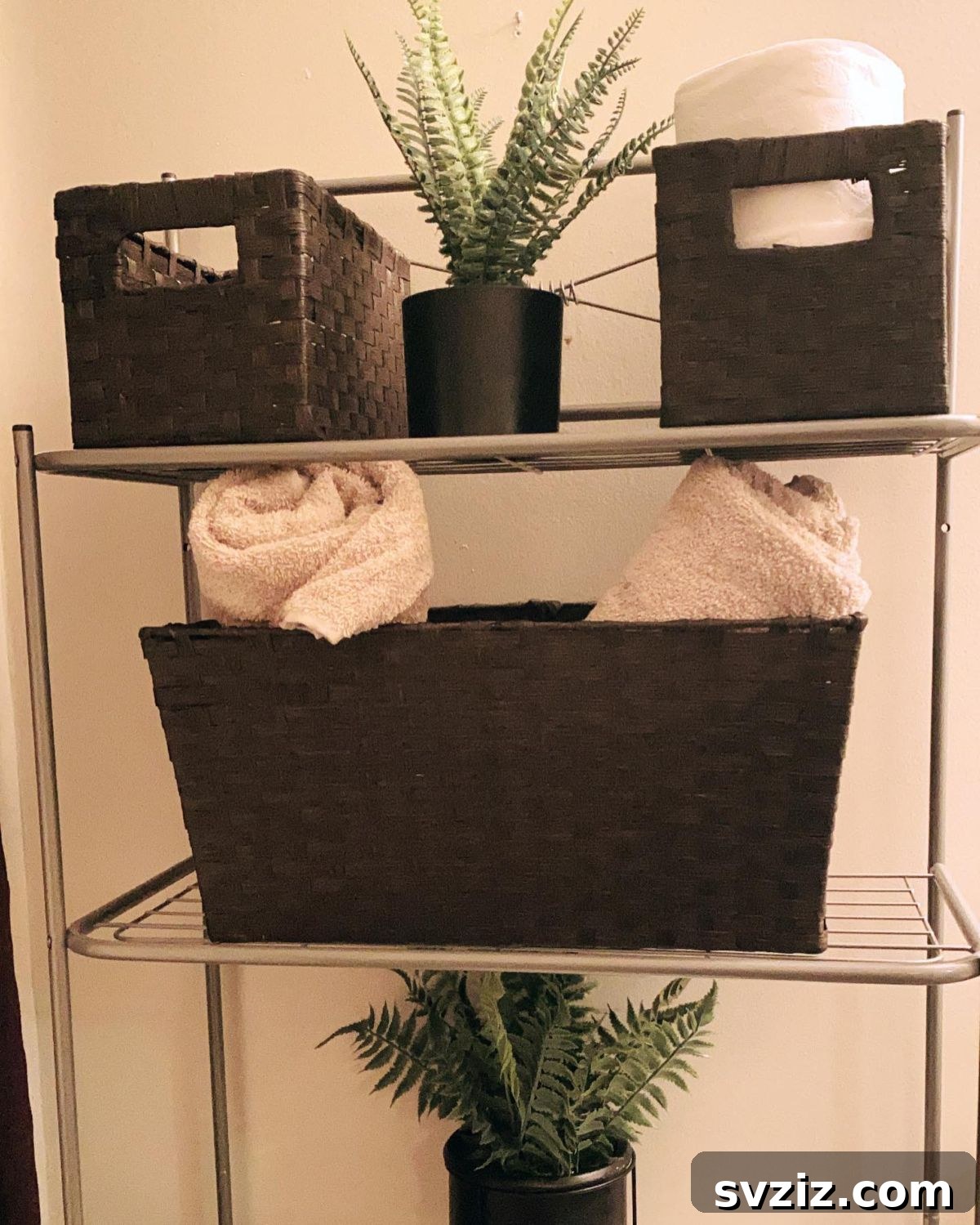 21 Smart Ways to Utilize the Space Above Your Toilet 5 Over-the-toilet rack with woven storage baskets for organization.