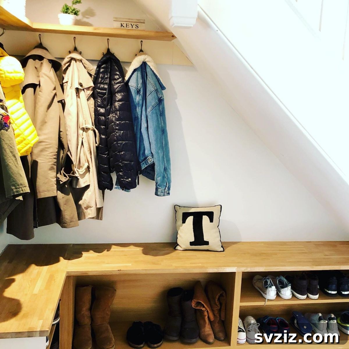 21 Clever Ways to Maximize Corner Space 7 6. Corner Coat Rack