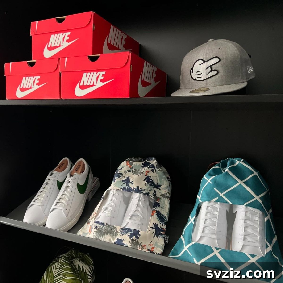 Shoes stored in fabric shoe bags in a closet