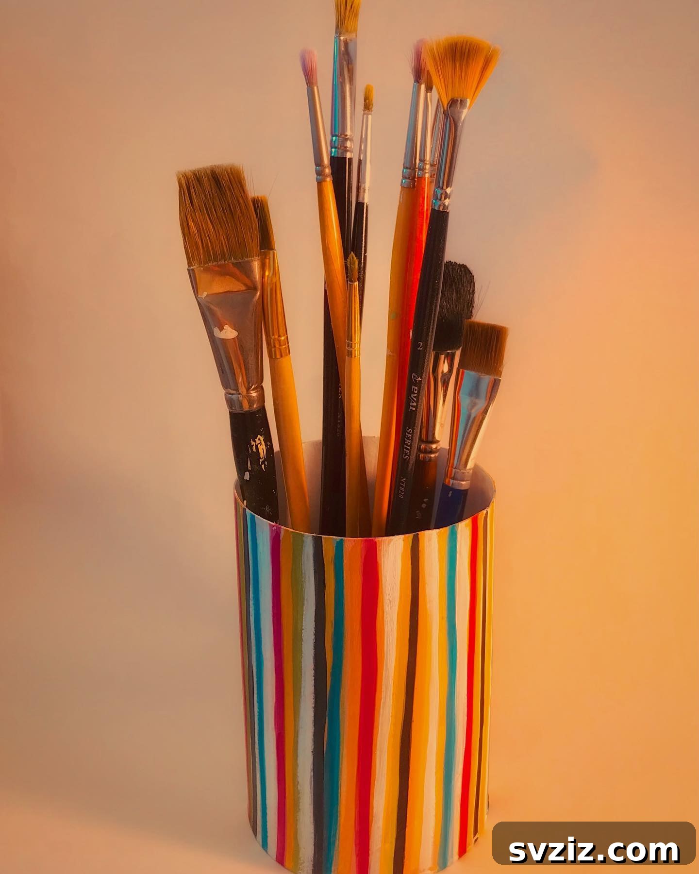 Cute and functional paintbrush holder made from an oatmeal canister