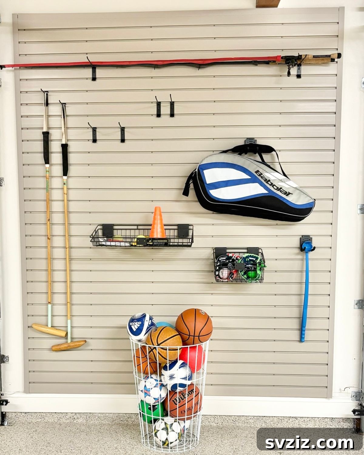 21 Genius Organizing Hacks for Master Organizers 11 A slat wall panel transforms garage organization, lifting tools, sports gear, and equipment off the floor to free up space.