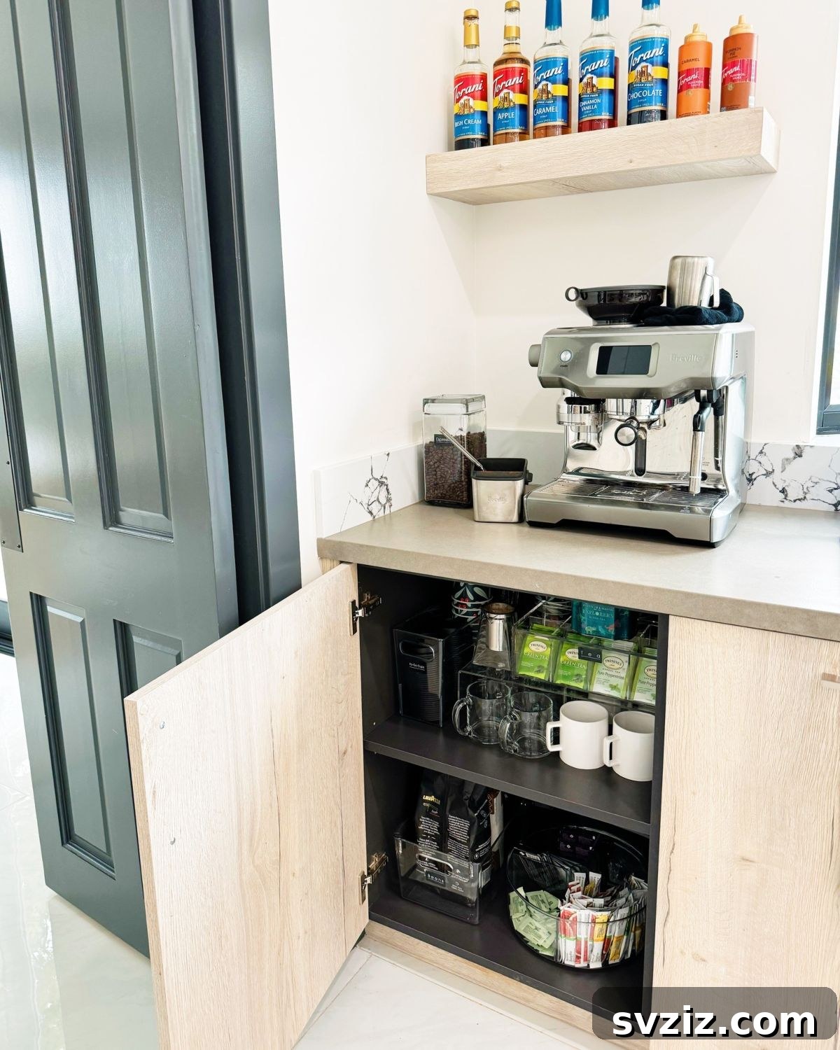 21 Genius Organizing Hacks for Master Organizers 16 An expertly arranged coffee and tea station uses an acrylic Lazy Susan, shelves, and bins for easy access to beverages and accessories.