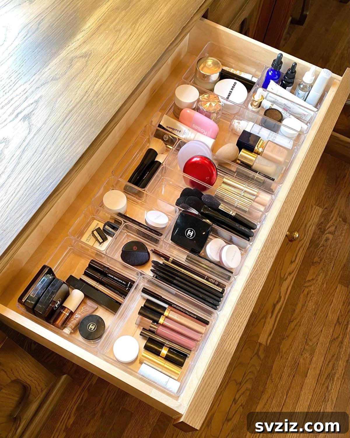 21 Genius Organizing Hacks for Master Organizers 3 Acrylic drawer trays provide perfect compartments for organizing makeup and small bathroom essentials, creating a tidy and accessible space.