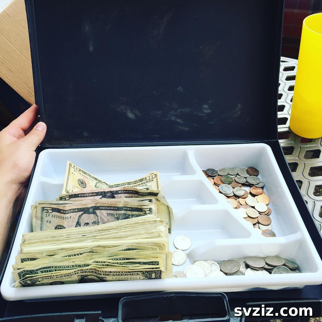 Beyond Cutlery: Smart Organization with Silverware Trays 14 Silverware Tray Used as a Cash Box for Money Organization
