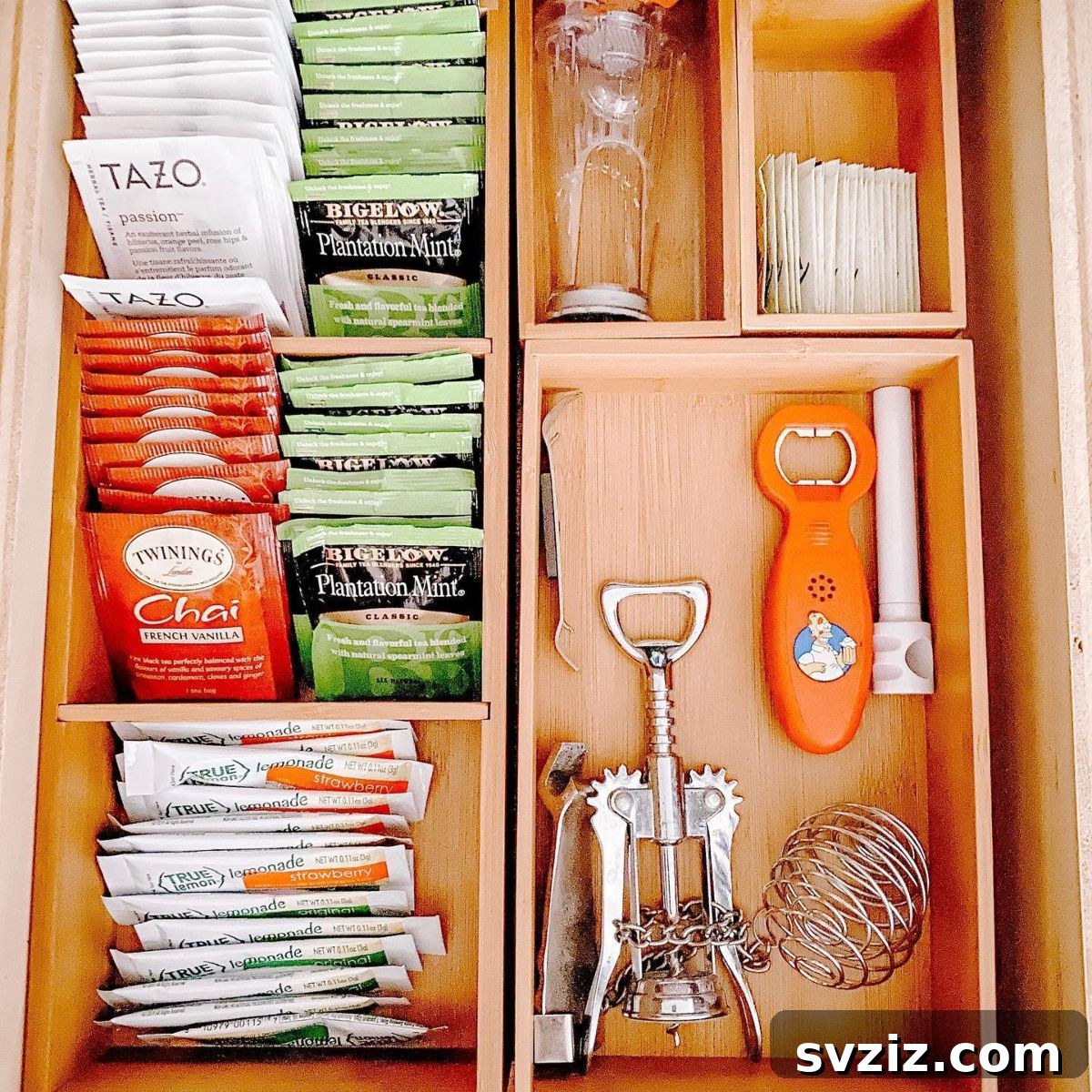 Beyond Cutlery: Smart Organization with Silverware Trays 10 Organized Tea Drawer with a Wooden Silverware Tray