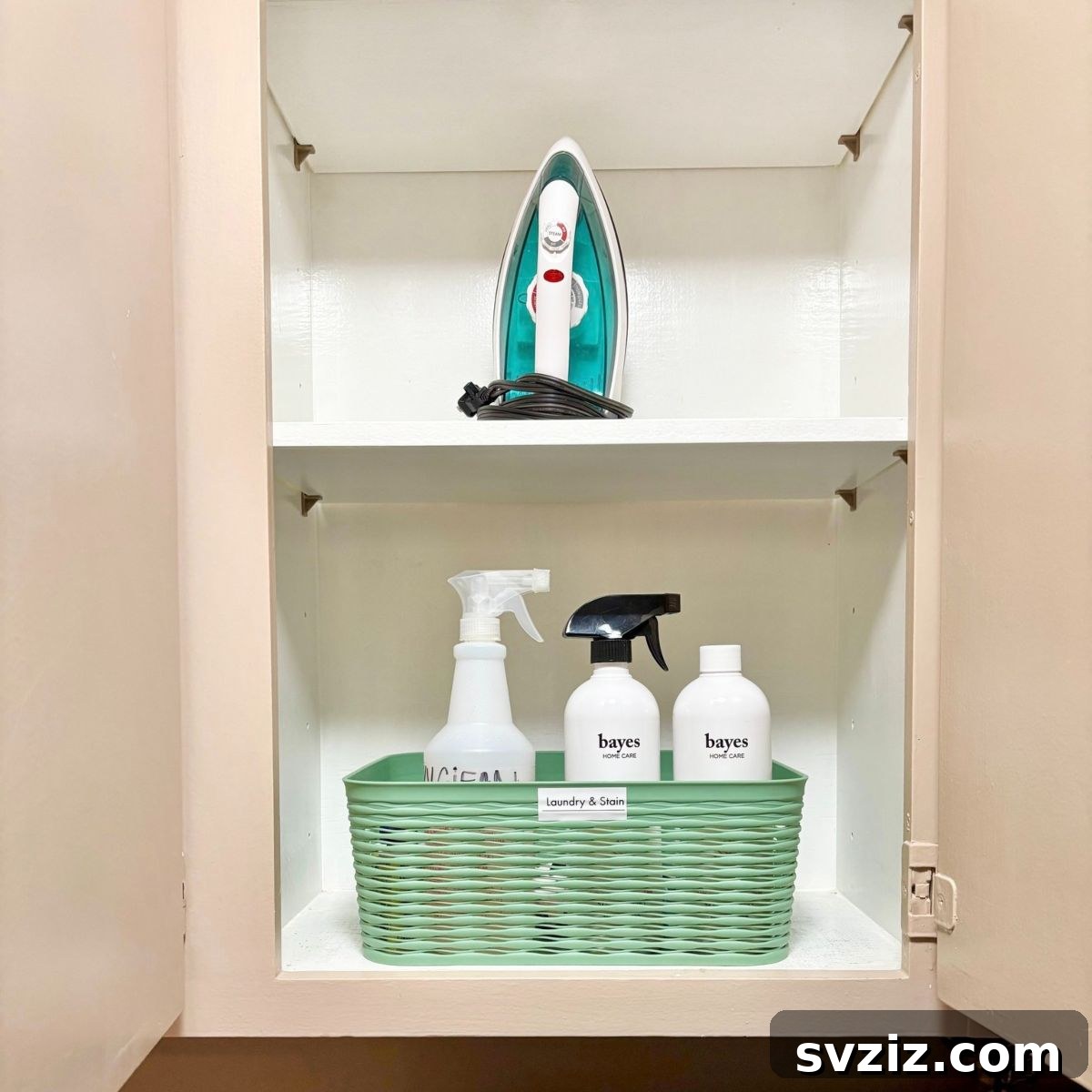 Minimalist Laundry Closet Organization with Green Storage Bins
