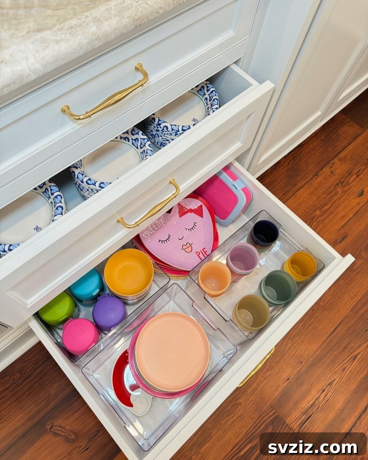 Designated kitchen drawer for kids' plates, cups, and utensils