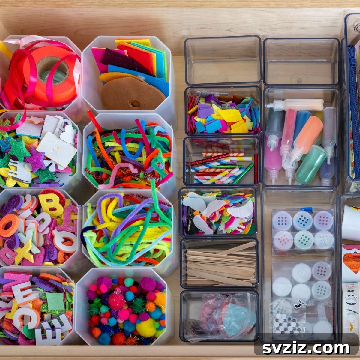 Kids craft supplies neatly categorized in labeled bins