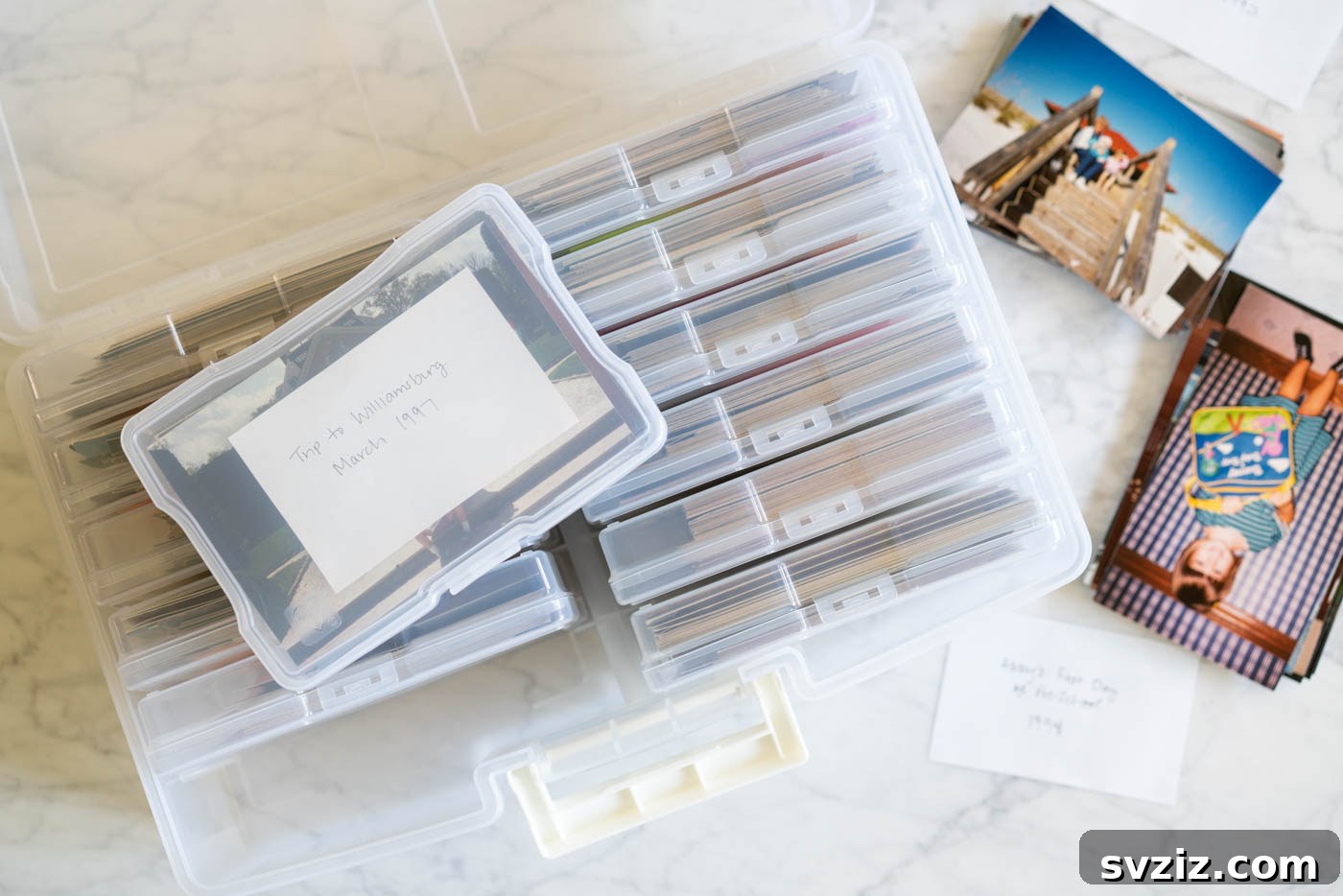 Photo organization using clear cases and index card labels