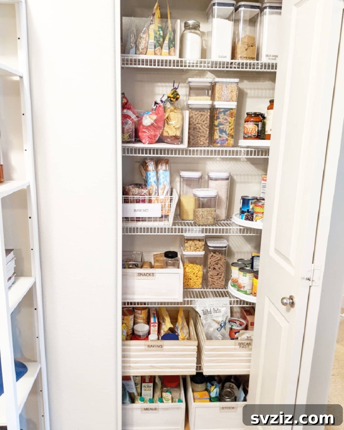 Wooden storage boxes neatly arranged in a pantry, adding a rustic touch.