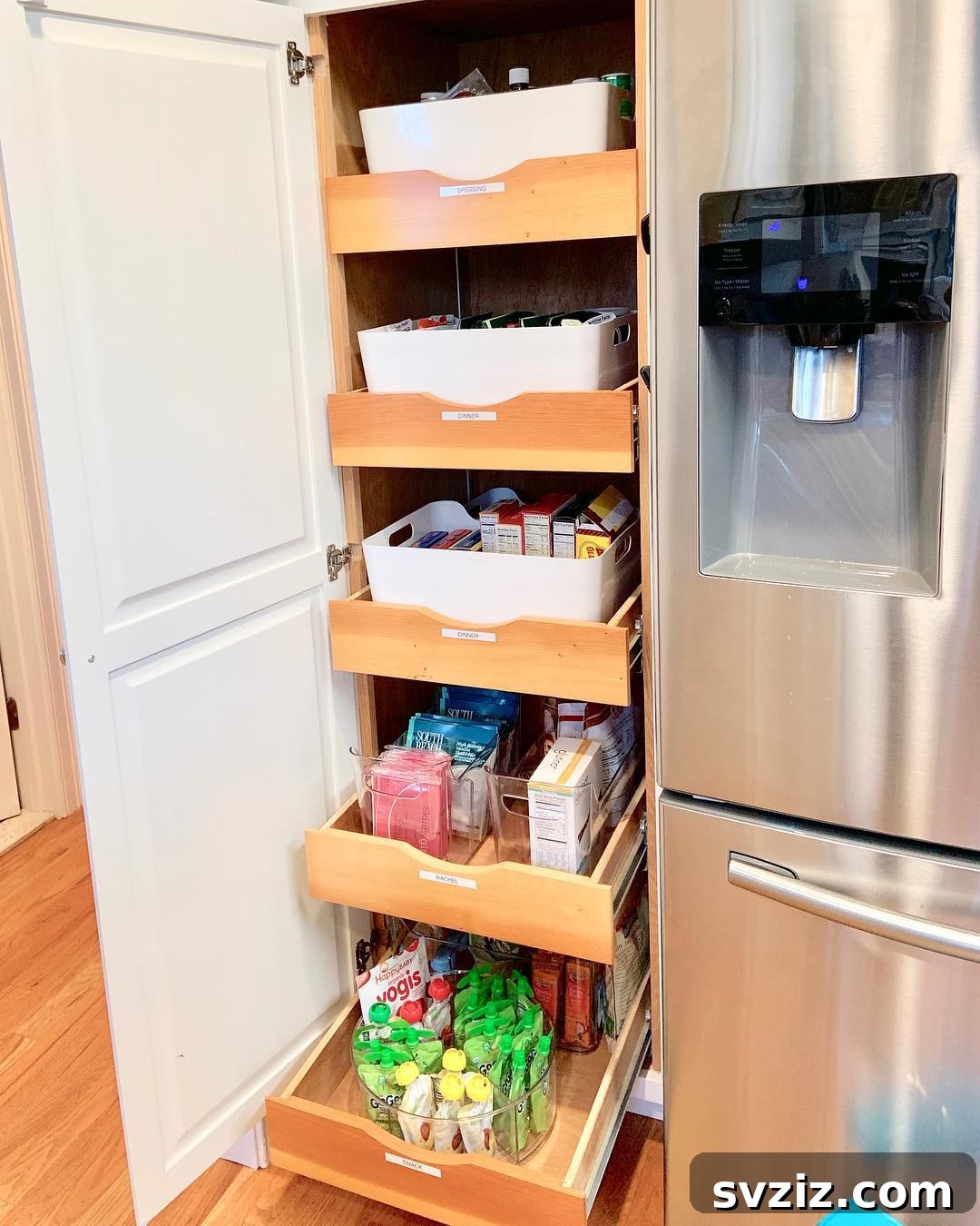 A small pantry featuring highly functional pull-out shelves for easy access to items.