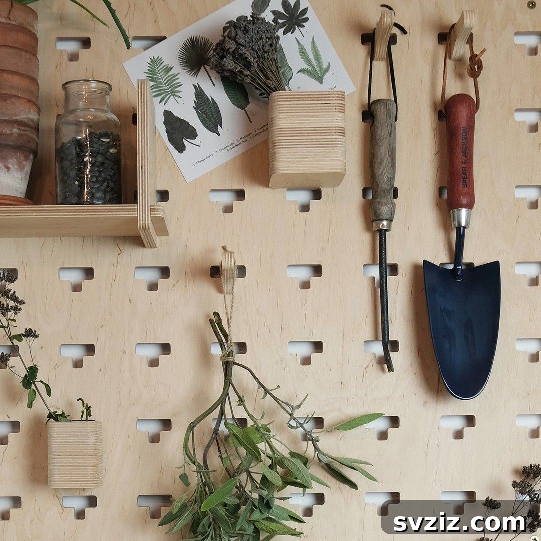 21 Clever Pegboard Organization Ideas 22 Gardening Setup with a pegboard for tools and plants