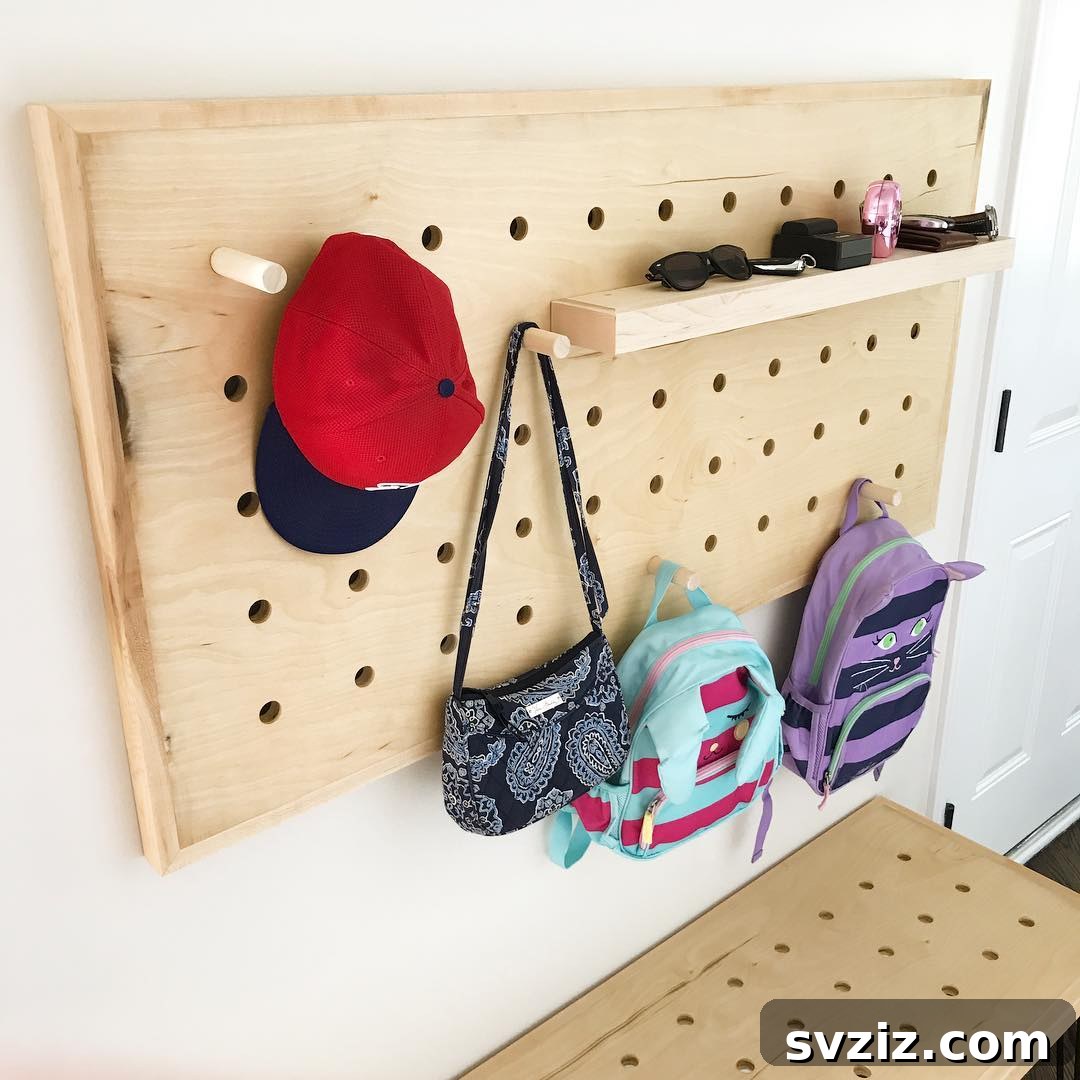 21 Clever Pegboard Organization Ideas 9 Entryway Storage solution using a pegboard for coats and keys
