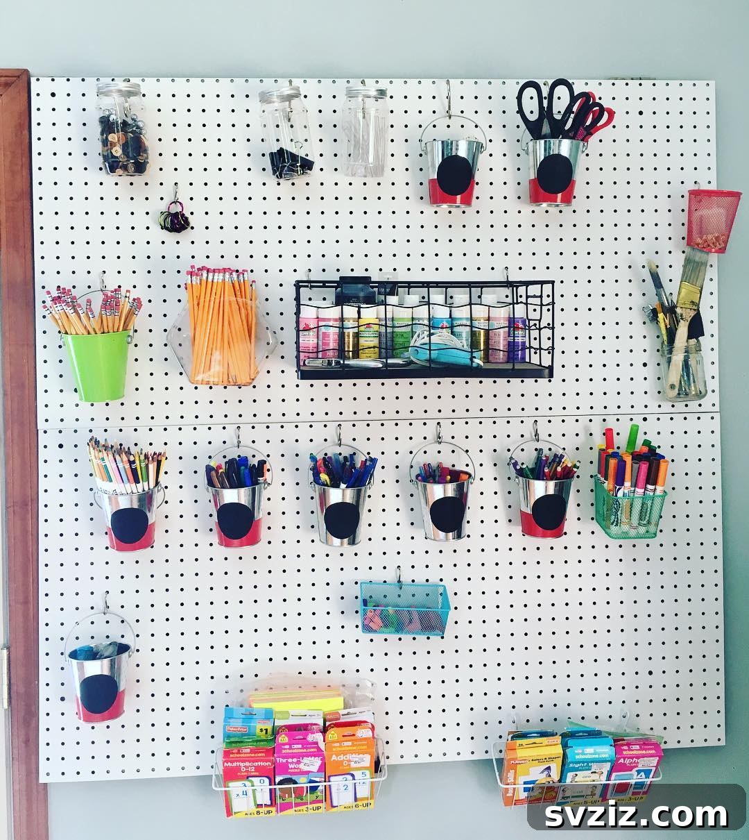 21 Clever Pegboard Organization Ideas 10 Craft Room Pegboard for organizing art supplies and tools