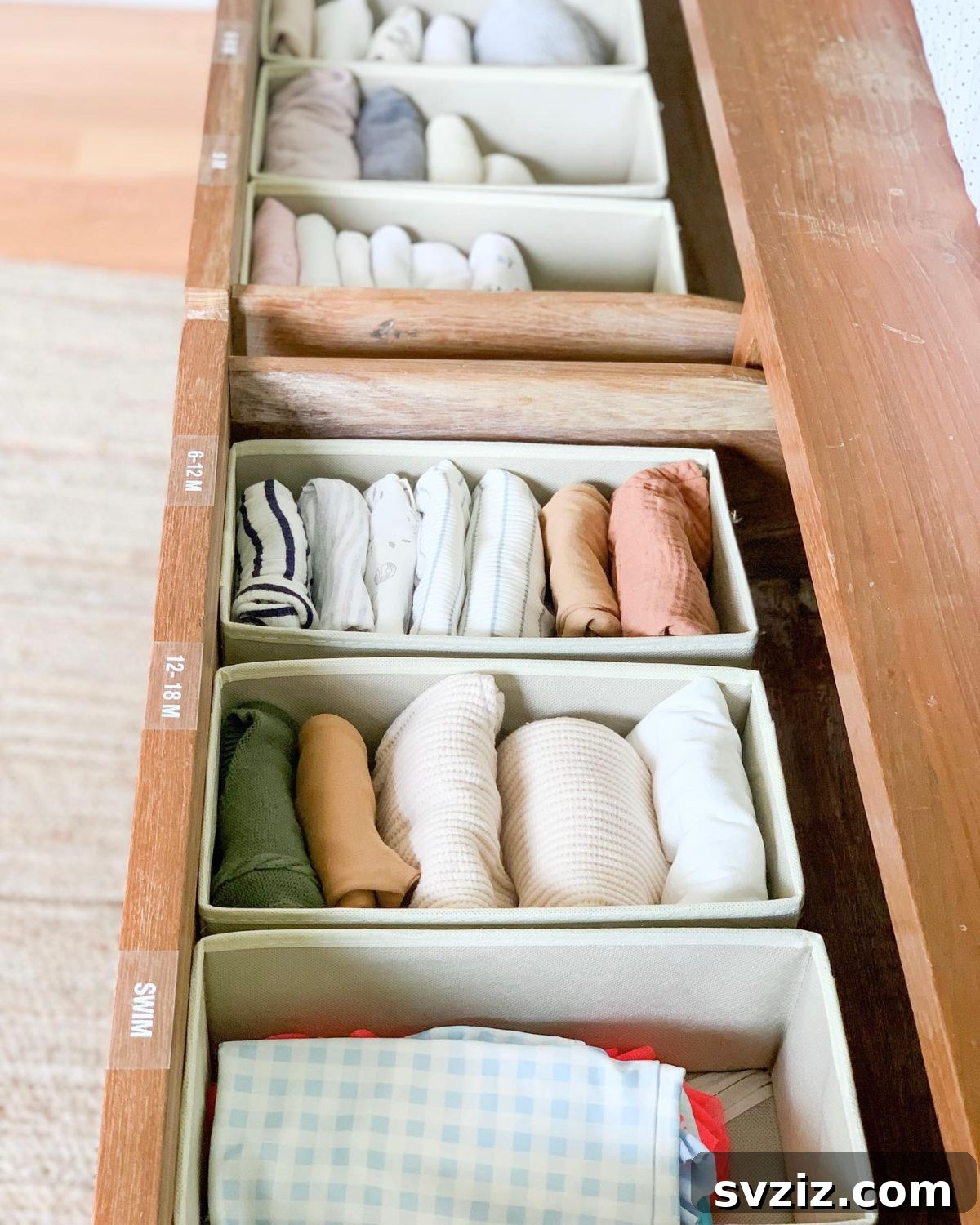 27 Chic & Stylish Home Organization Hacks for a Beautifully Transformed Space 20 Baby nursery closet organized with size-labeled bins for clothes