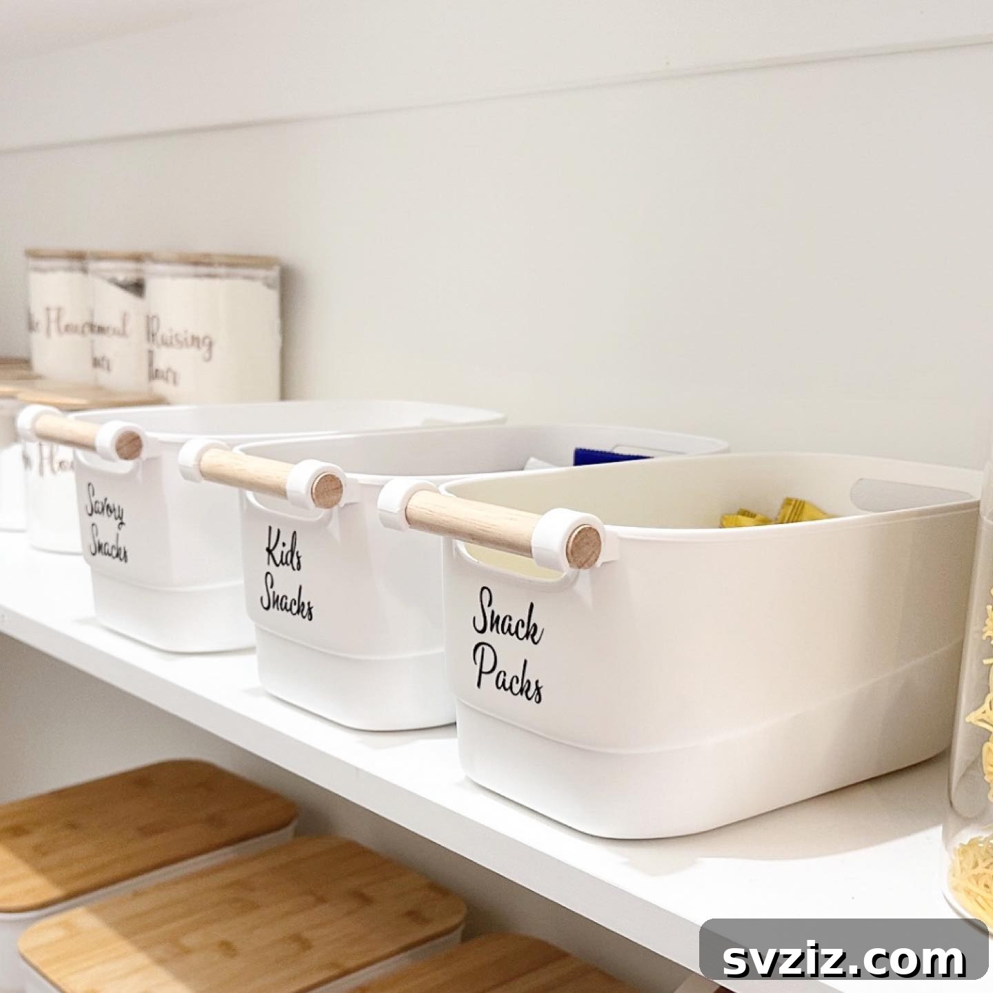 27 Chic & Stylish Home Organization Hacks for a Beautifully Transformed Space 4 Stylish storage baskets with wooden handles for snack organization