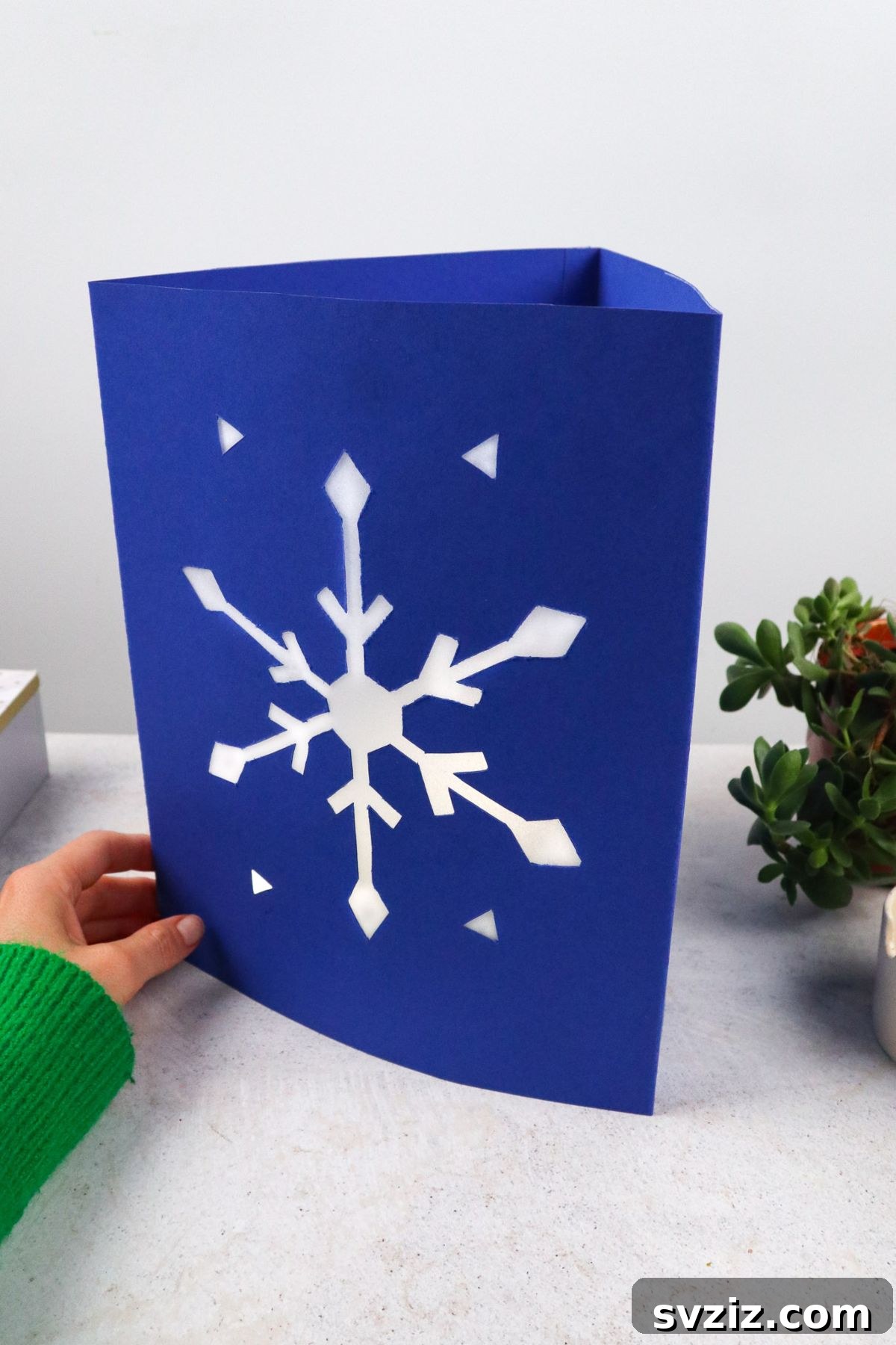 Sparkling Snowflake Luminaries 13 Cute Snowflake Lanterns, showing multiple finished lanterns glowing.