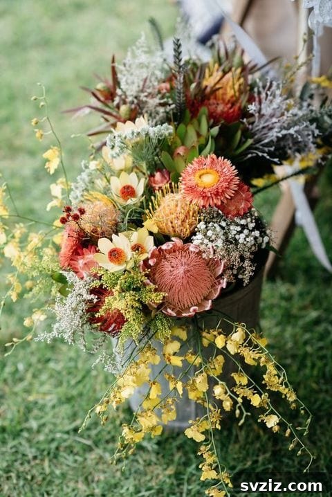Host a Magical Backyard Wedding Without Breaking the Bank 5 Wildflower bouquet in a metal bucket