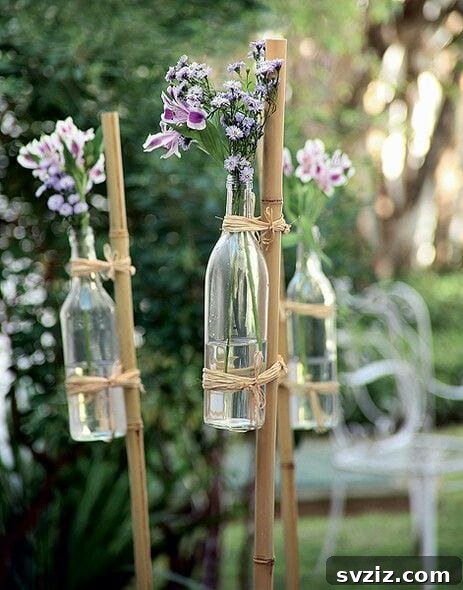 Host a Magical Backyard Wedding Without Breaking the Bank 9 Wedding aisle markers with bottles and flowers