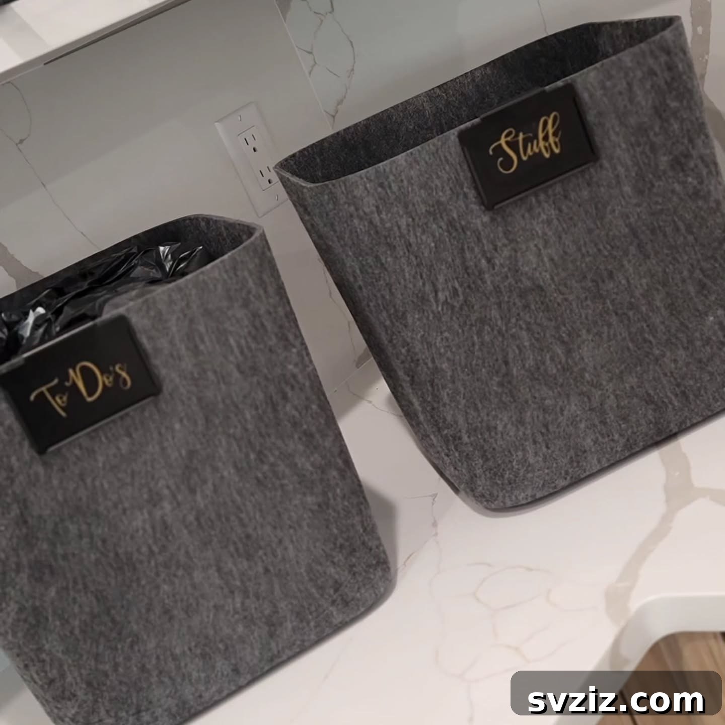 21 Genius Hacks to Master Your Coat Closet Organization 11 Felt storage bins organizing a coat closet shelf.