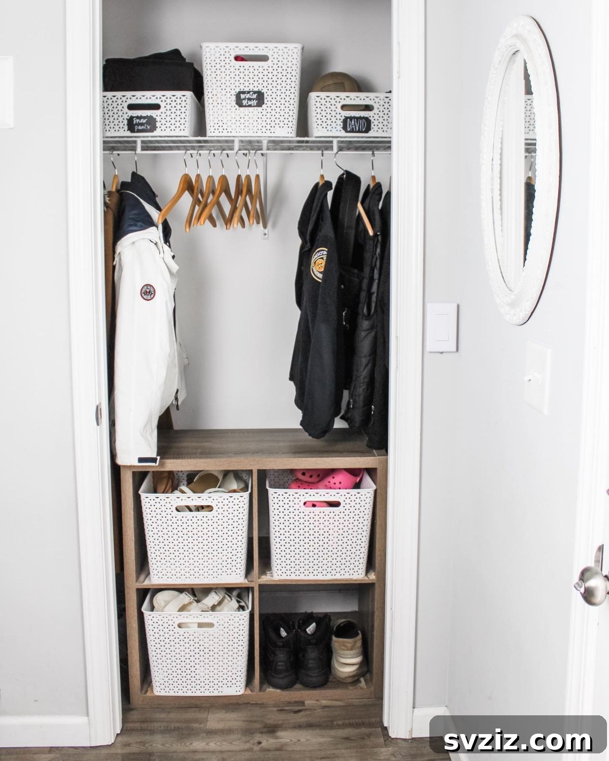 21 Genius Hacks to Master Your Coat Closet Organization 15 Cubbies filled with baskets for organized storage in a coat closet.