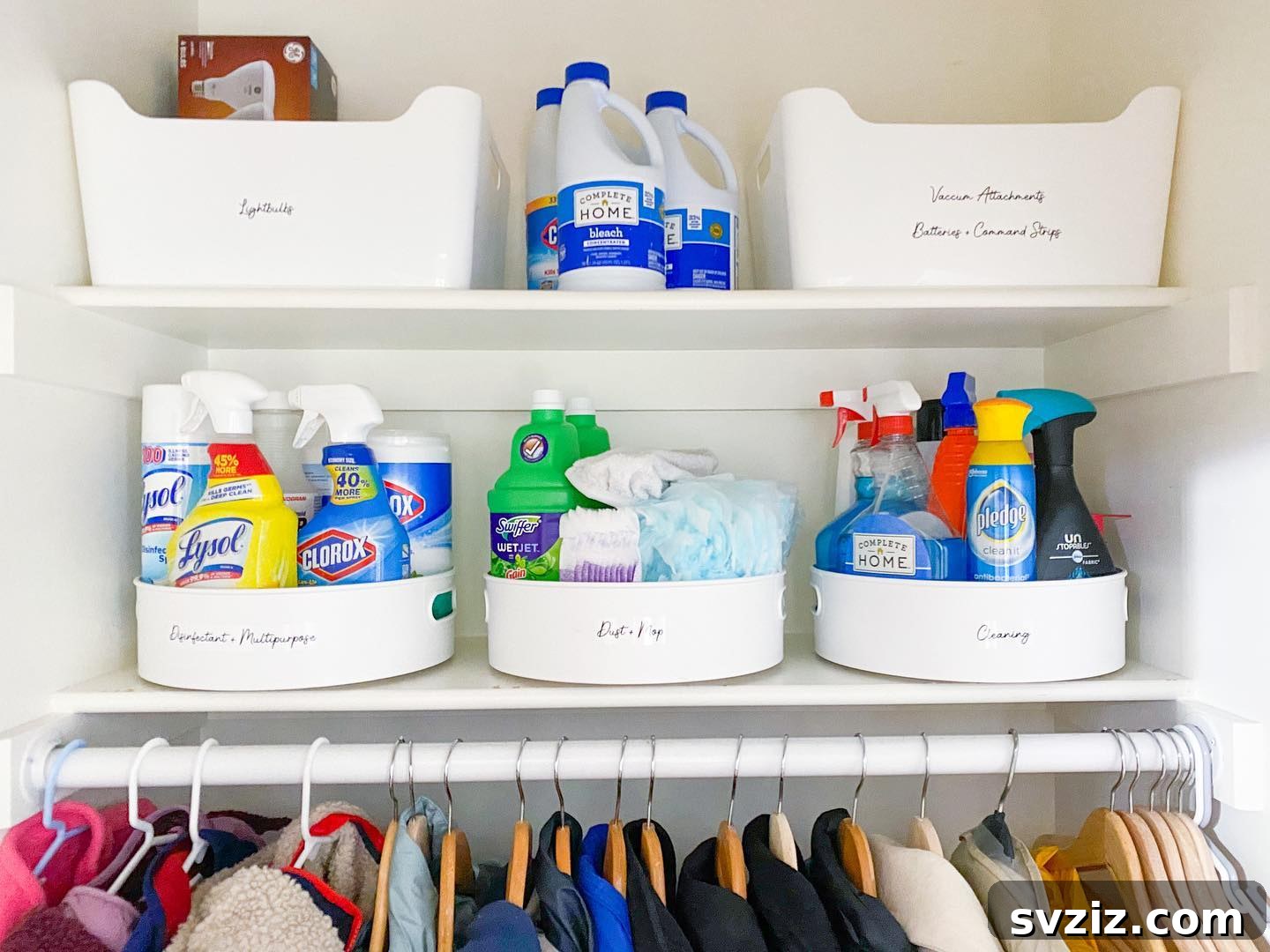 21 Genius Hacks to Master Your Coat Closet Organization 16 Cleaning products neatly stored in clear plastic bins in a coat closet.