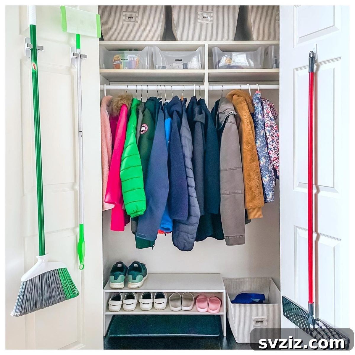 21 Genius Hacks to Master Your Coat Closet Organization 17 Brooms and mops neatly stored vertically on a coat closet wall.