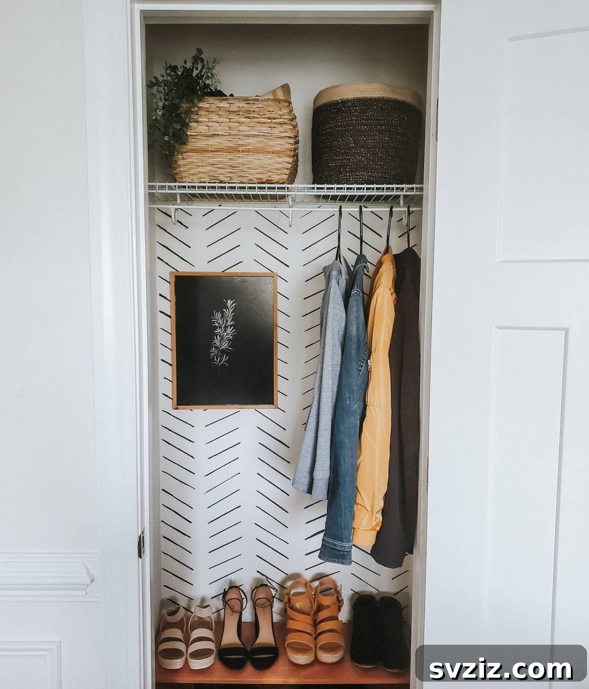 21 Genius Hacks to Master Your Coat Closet Organization 3 Organized shoes on a bottom shoe rack inside a coat closet.