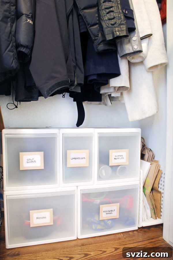 21 Genius Hacks to Master Your Coat Closet Organization 23 Stackable drawers for organized storage in a coat closet.