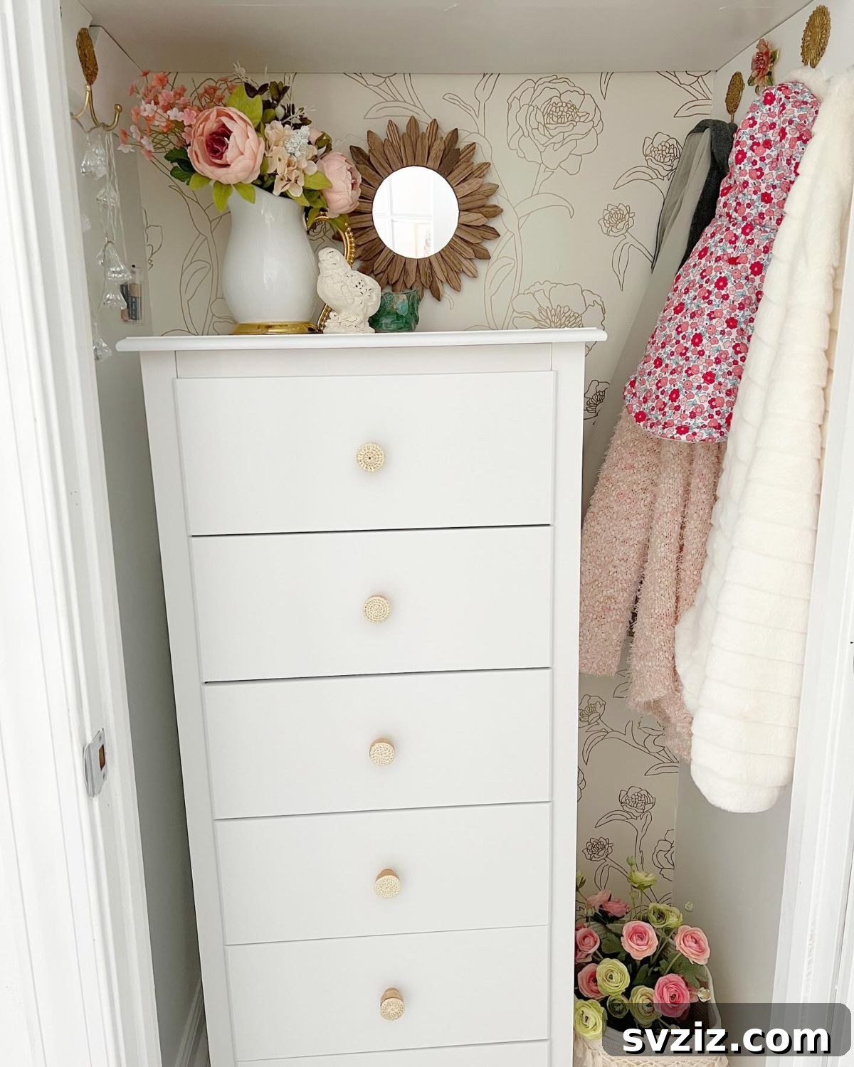 21 Genius Hacks to Master Your Coat Closet Organization 9 Storage drawer unit inside a coat closet for organized items.