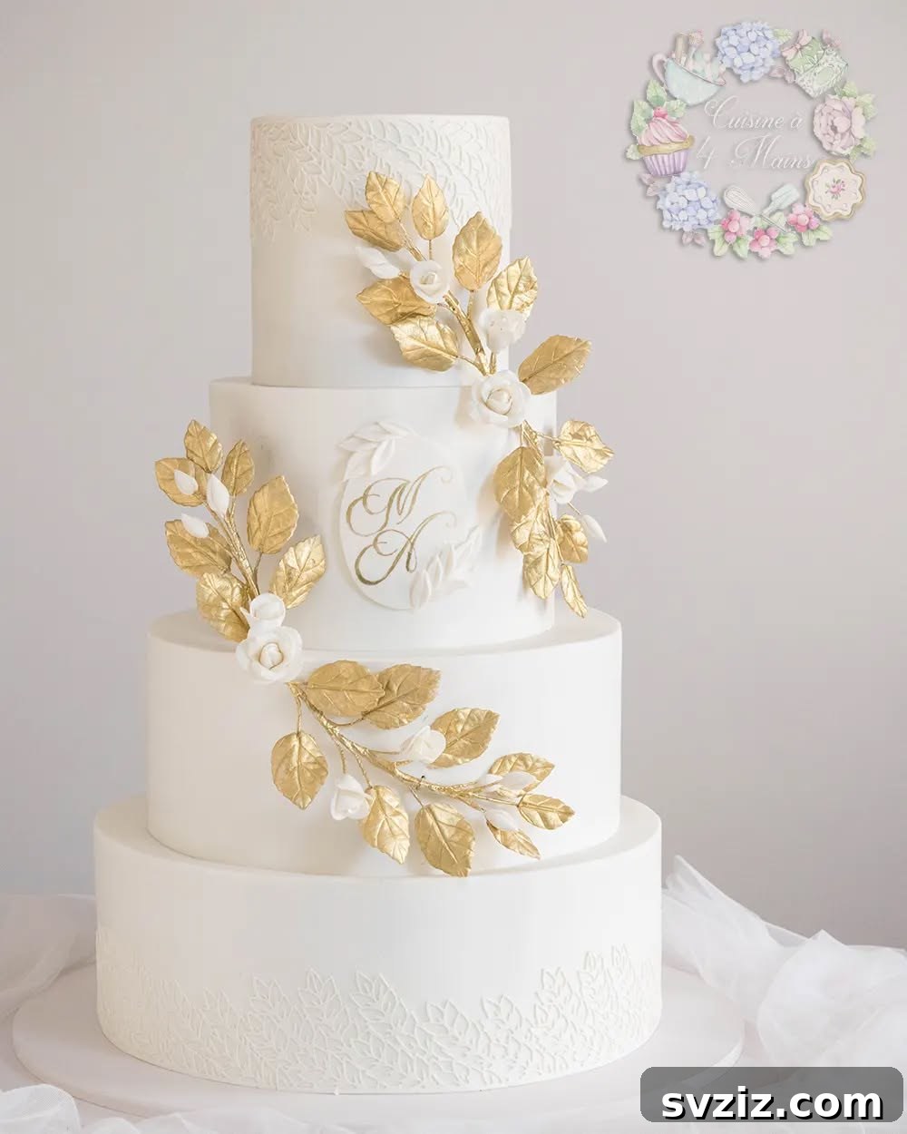 27 Elegant Wedding Cake Inspirations 15 A magnificent ivory wedding cake featuring golden laurel leaves cascading down the tiers, surrounding a lovely golden Mr & Mrs motif, evoking the grandeur of ancient Roman feasts.
