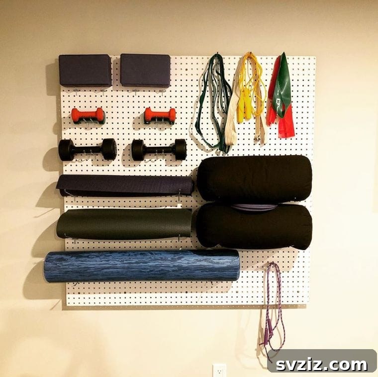 Pegboard for organizing home gym equipment