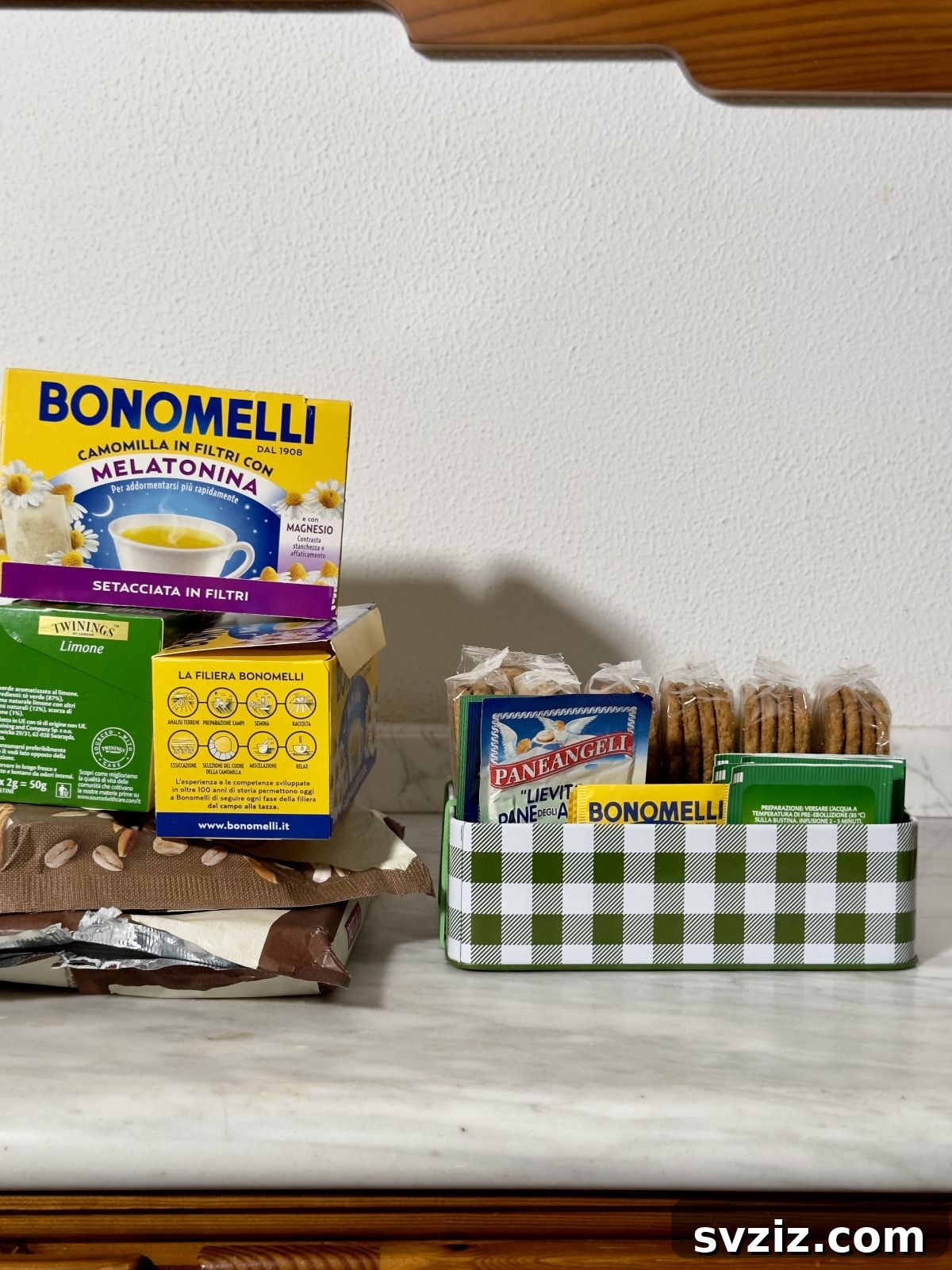 Tin boxes organized with rubber bands
