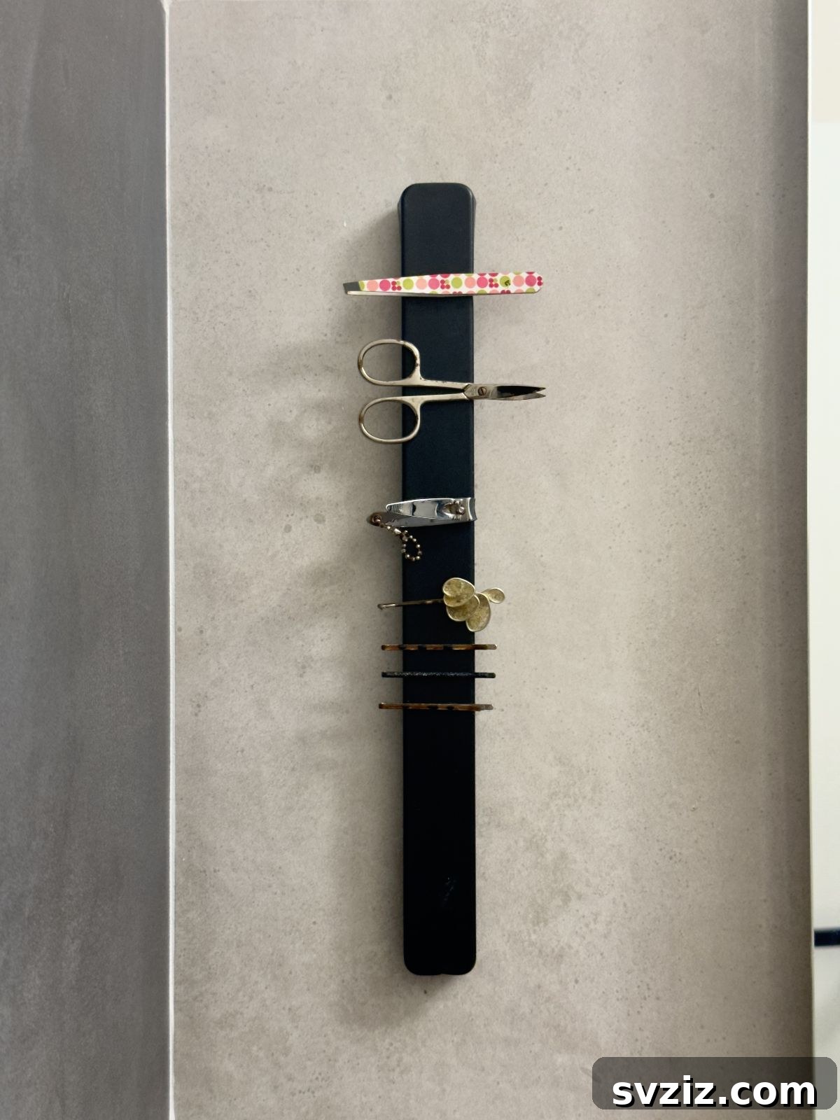 Magnetic strips installed for bathroom tool storage