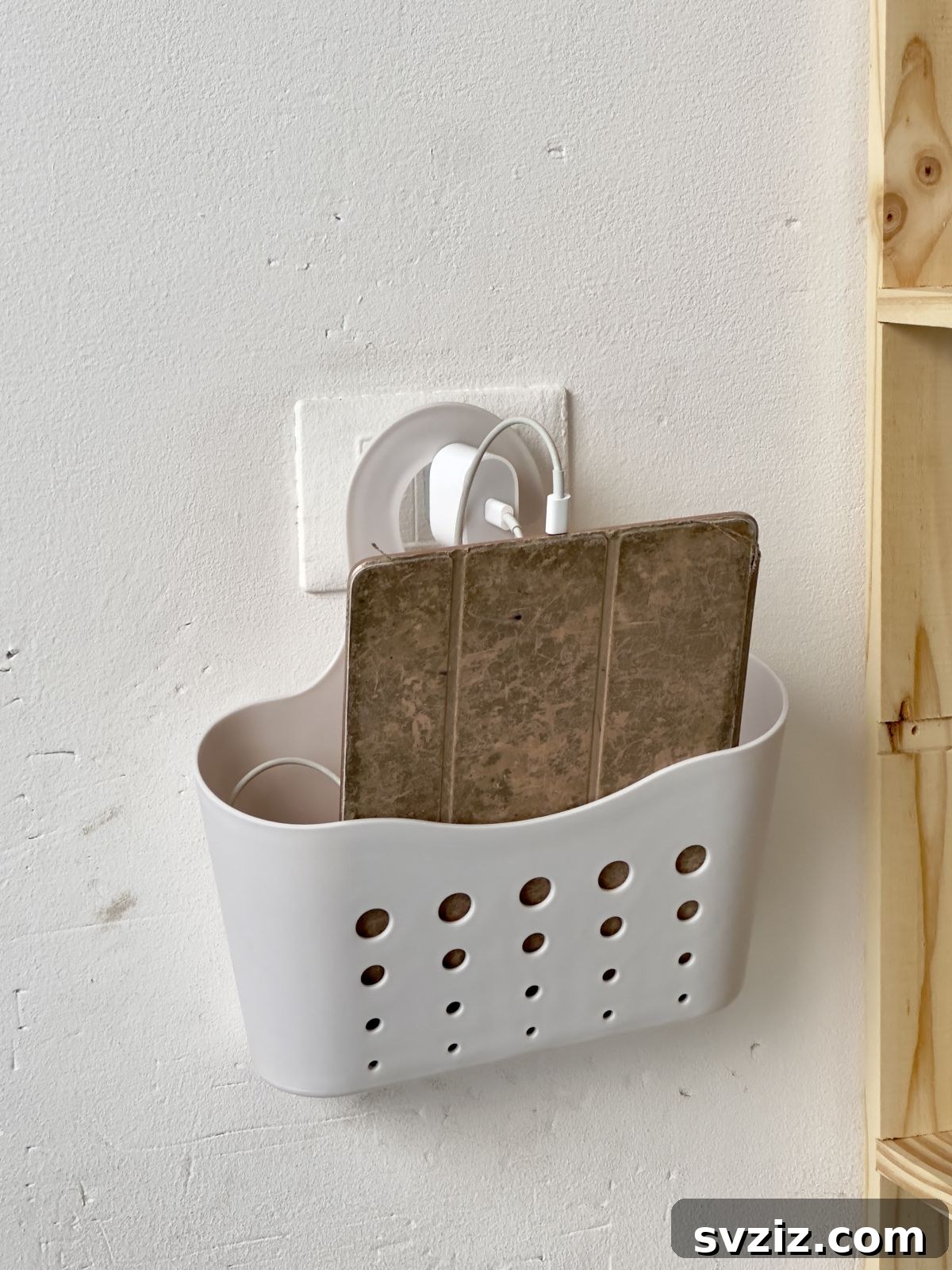 Shower caddy repurposed as a charging station