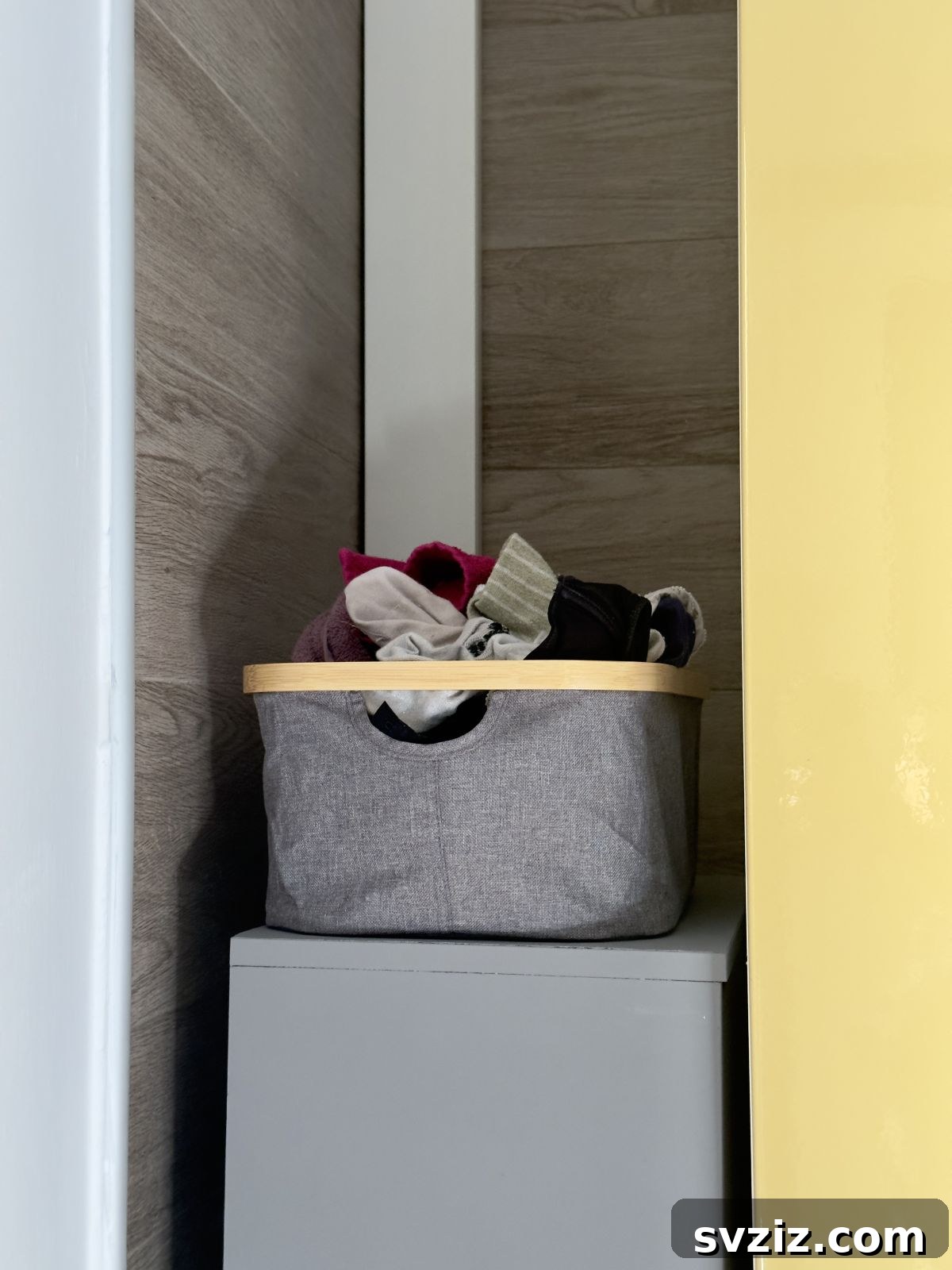 21 Genius Home Organization Hacks for ADHD Brains 4 2. Multiple Laundry Hampers for easier sorting