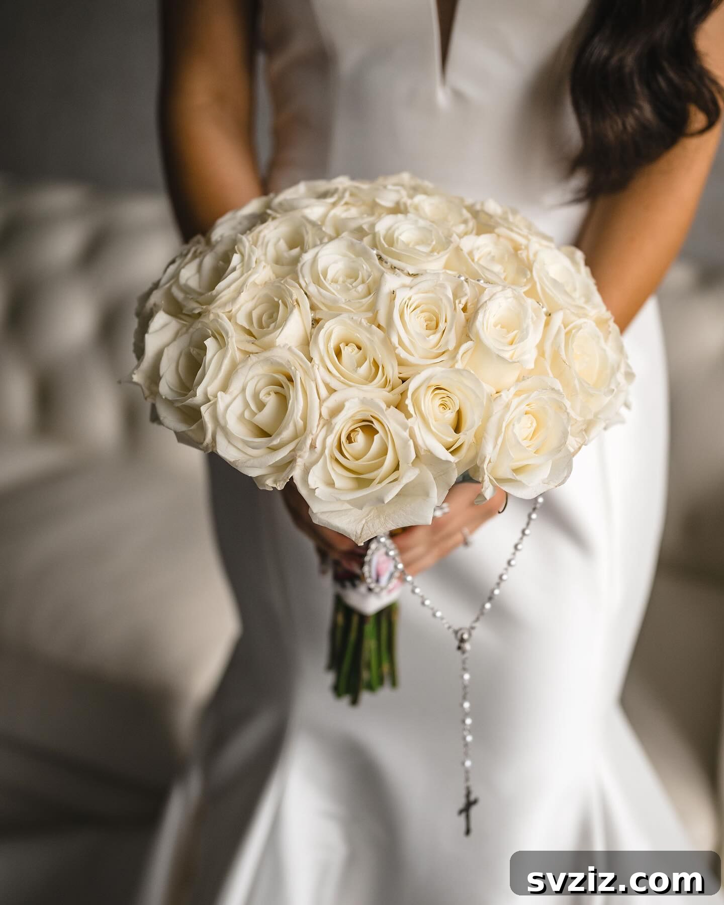 Close-up of an enchanting white rose bridal bouquet, symbolizing purity and timeless love for a classic wedding.