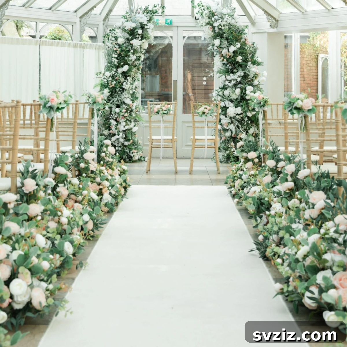 Enchanting blush pink floral pathway leading to a wedding ceremony, a romantic choice for a classic wedding.