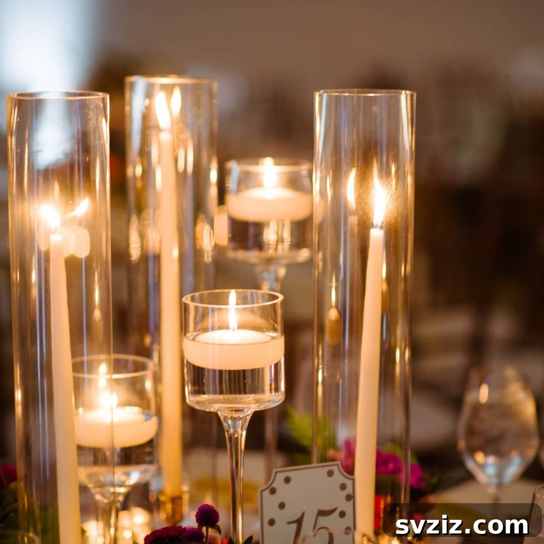 Romantic wedding setting illuminated by numerous candles, creating a fairy tale ambiance with floating and taper candles.
